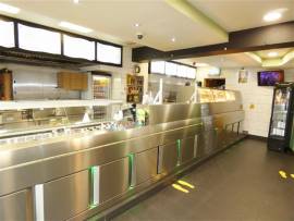 PRISTINE FISH & CHIP SHOP NEAR MAINLINE TRAIN STATION IN RESIDENTIAL AREA, SAME OWNER 20 YEARS, INCLUDES 2 SELF CONTAINED FLATS, PROFITABLE BUSINESS, NEW LEASE, FREEHOLD OPTION
