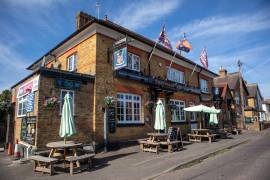 SURREY - WET-LED PUB IN RESIDENTIAL AREA